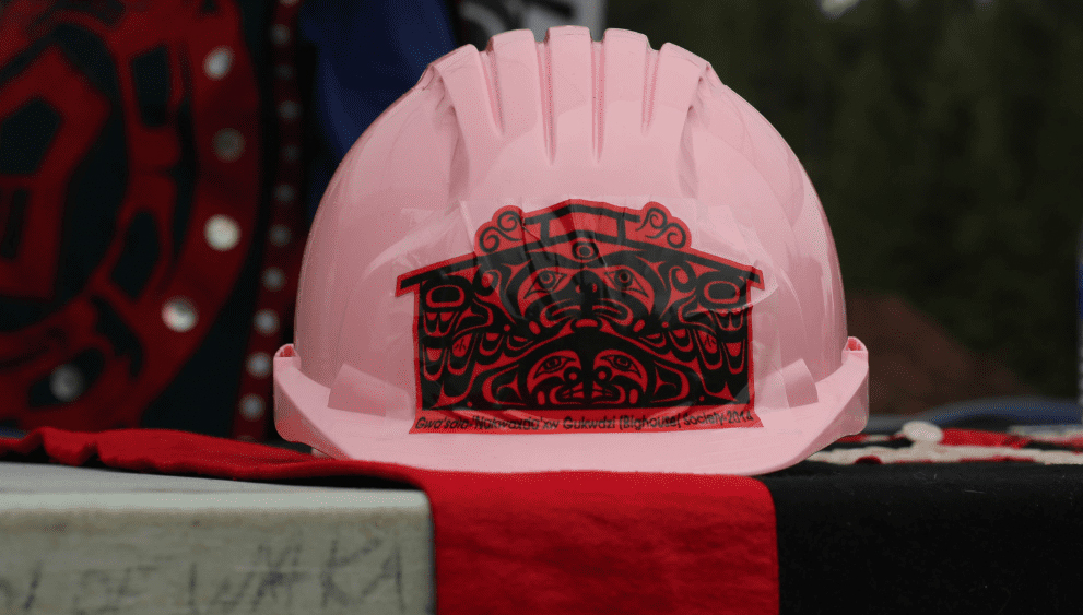 pink hardhat for the Gwa'sala-'Nakwaxda'xw Bighouse Society